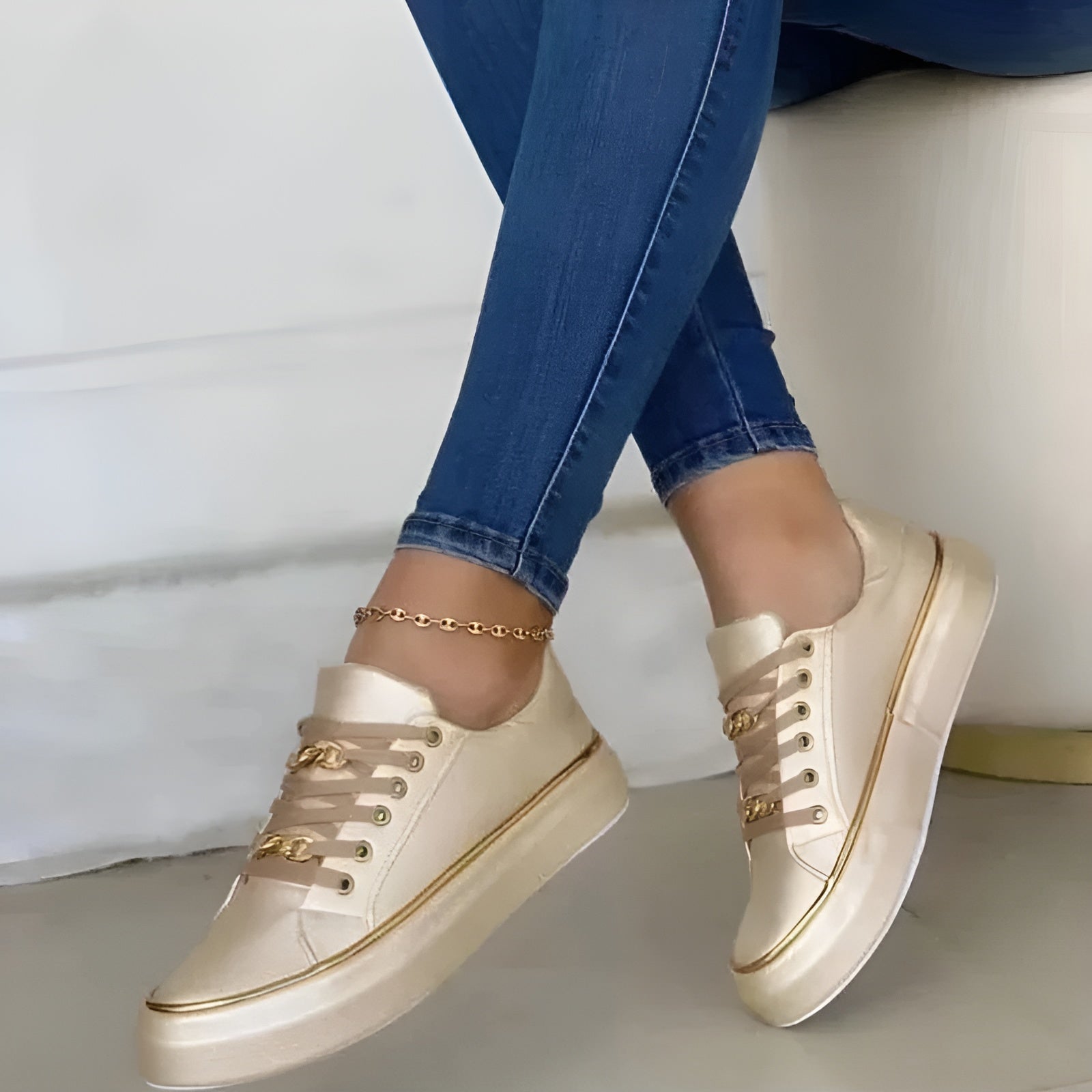 Lucinda Bergström | White Platform Sneakers with Gold Chain Detail