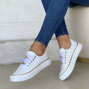 Lucinda Bergström | White Platform Sneakers with Gold Chain Detail